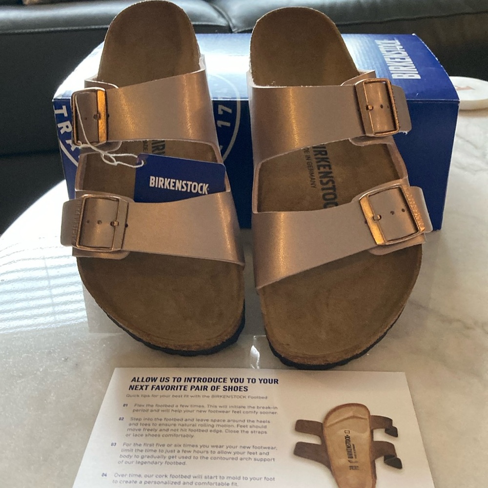 These are super cute Birkenstocks, Arizona style copper color, Size 40. Like new